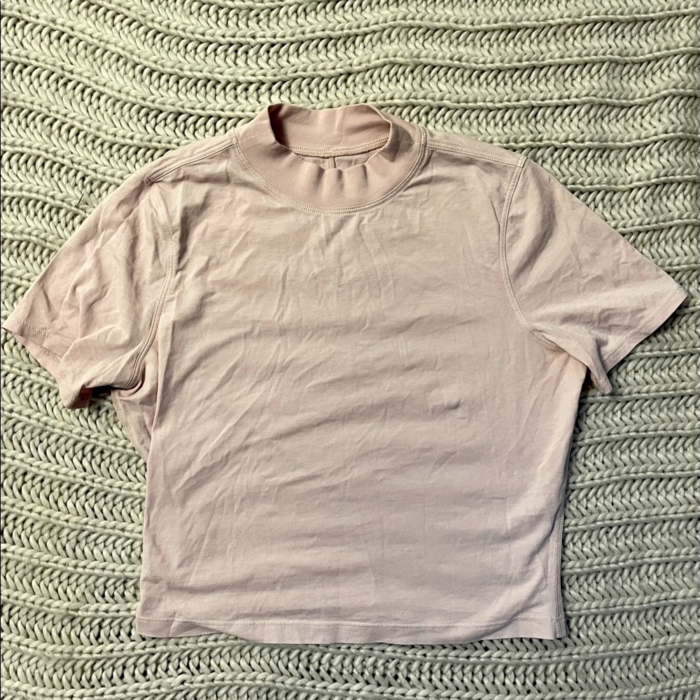 Lululemon high neck crop top in baby pink